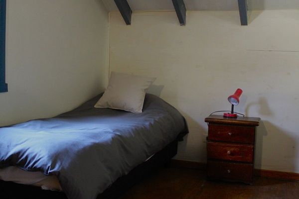 Cama en Habitación Cuádruple mixta con baño compartido