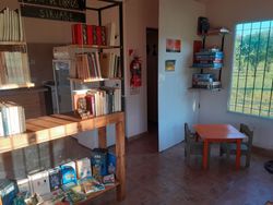 LaNubiaCabanas - Barra de libros y juegos de mesa