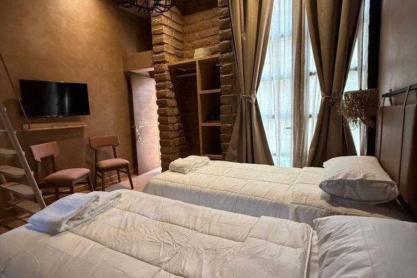 Habitación Triple Deluxe (Mitu Hotel)