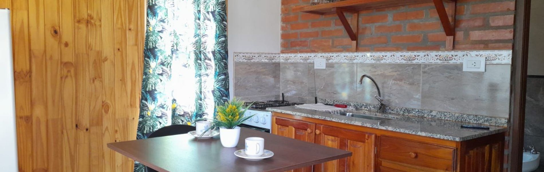 Sala de estar y cocina integrada