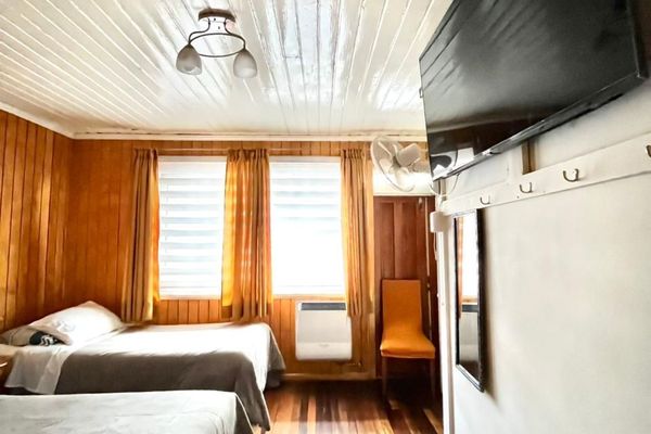 Habitación triple con baño compartido