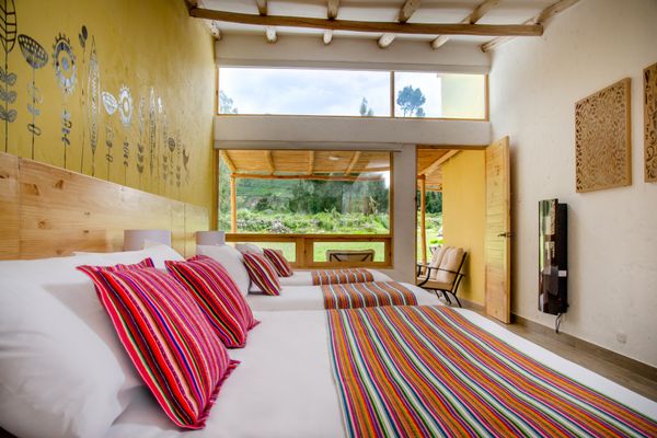 HABITACIÓN DELUXE CUADRÚPLE CON VISTA A LA MONTAÑA