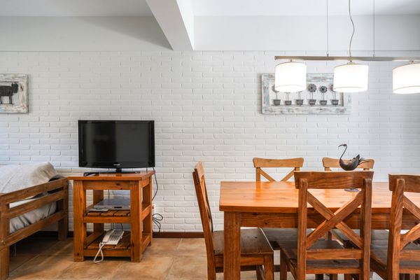 Tríplex clásico con 2 1/2 baños.