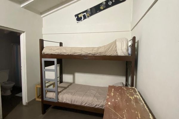 Cama en Habitación Cuádruple mixta con baño privado