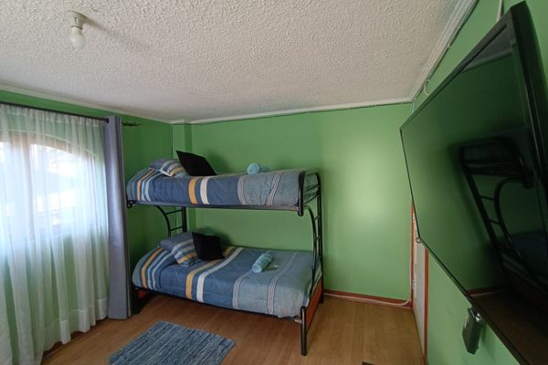 Habitación Triple con Litera y baño compartido