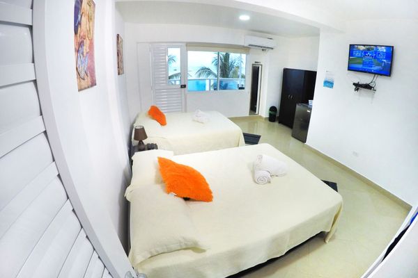 HABITACION CUADRUPLE CON BALCON VISTA AL MAR 