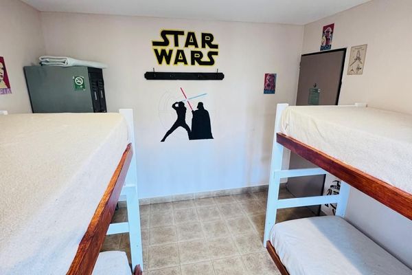 Cama Individual en Habitación Compartida