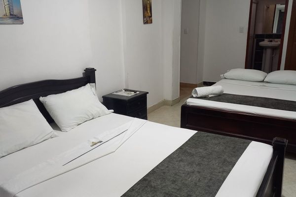 HABITACION DOS CAMAS DOBLES CON AIRE