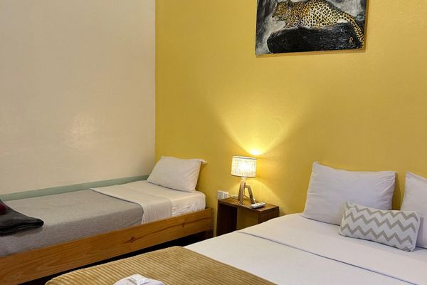 Habitación 1Mat 1 Single - Triple