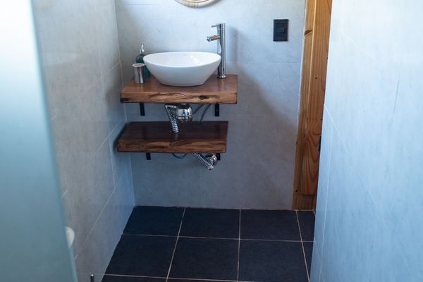 baño cabaña aurora