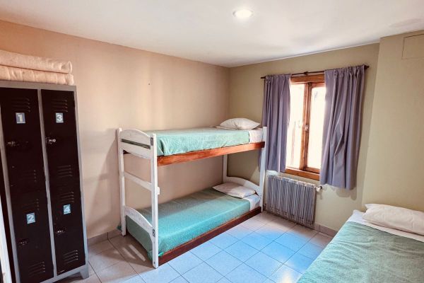 Cama Individual en Habitación Compartida