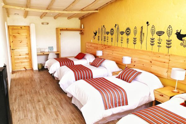 HABITACIÓN DELUXE CUADRÚPLE CON VISTA A LA MONTAÑA