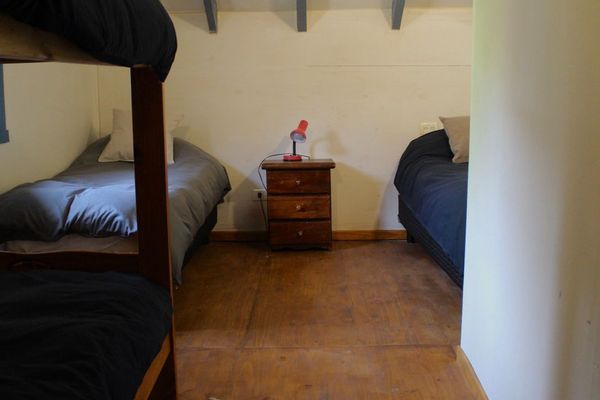 Cama en Habitación Cuádruple mixta con baño compartido