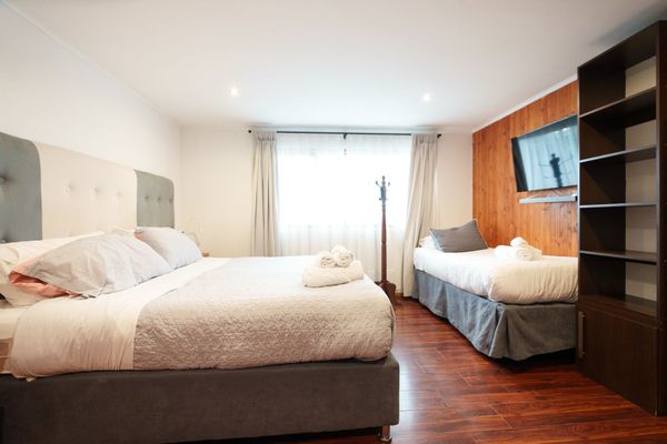 Habitación Triple Vista Parcial Lago
