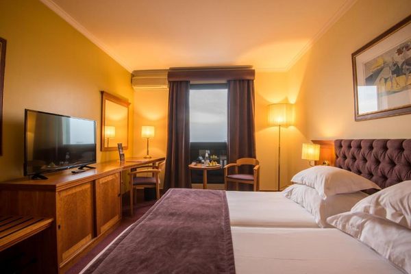 Habitación Doble con cama supletoria (2 adultos + 1 niño) - 2 camas