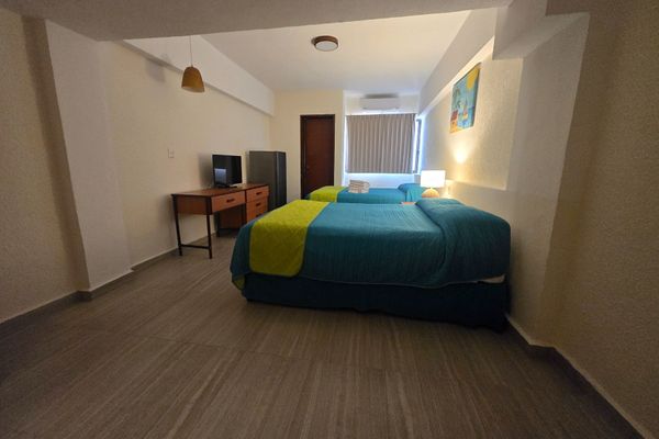 Habitación Estándar Dos Camas Matrimoniales-No Fumar-Desayuno Incluido