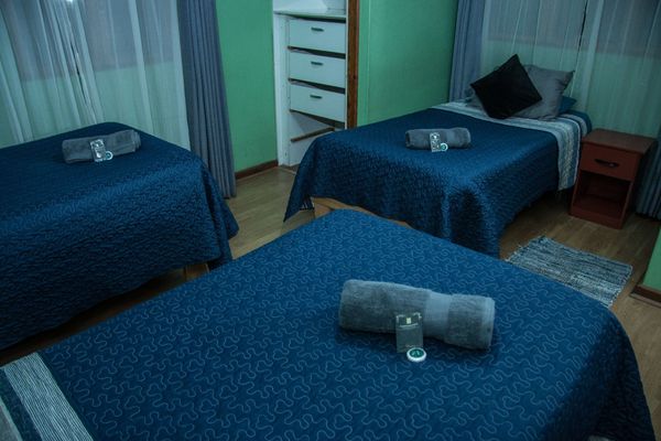 Habitación Triple Estandart con baño compartido