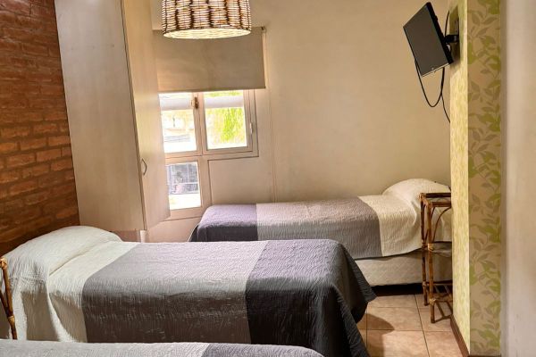 Habitación Triple (3 Individuales)