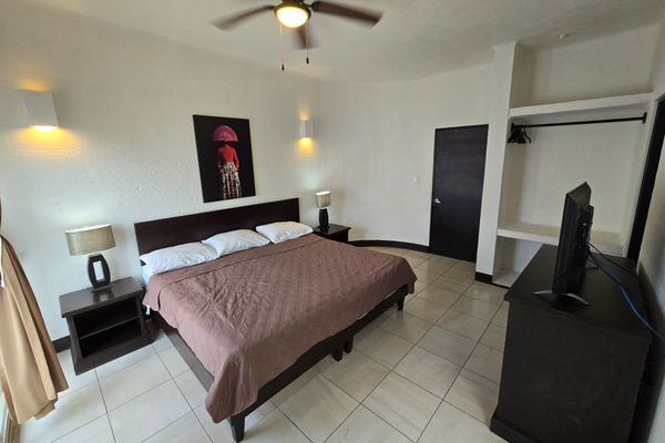 Villa con Balcón Superior