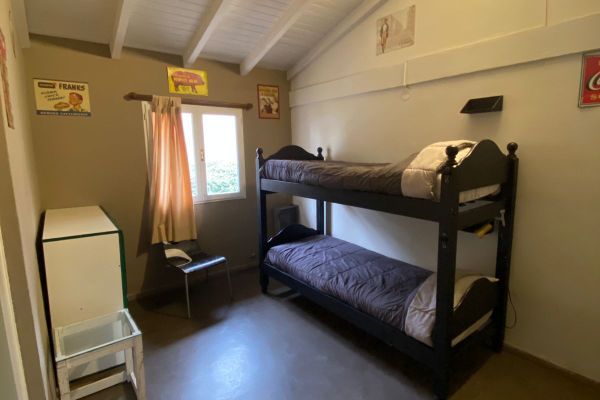 Cama en Habitación Séxtuple mixta con baño privado