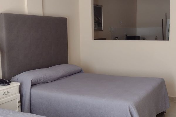 Monoambiente dos camas Queen