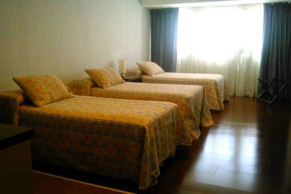 Suite Familiar (1 Cama King + 3 individuales)