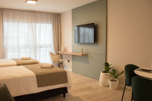 Monoambiente con 2 camas individuales