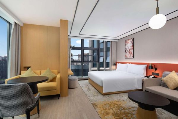 Habitación Deluxe con cama extragrande y sofá cama