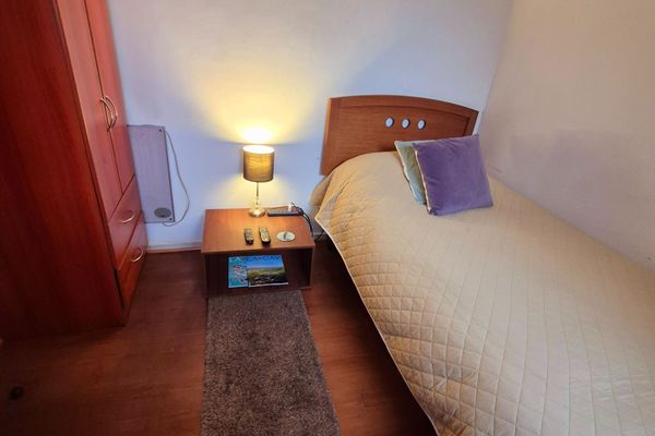 Habitación Individual con Baño Compartido