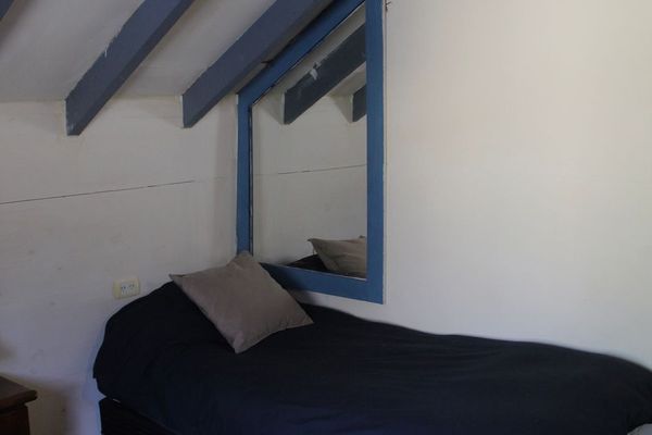 Cama en Habitación Cuádruple mixta con baño compartido