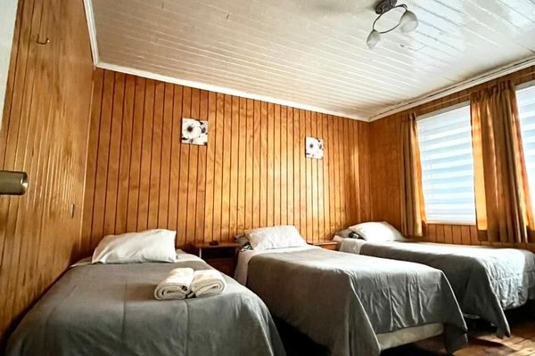 Habitación triple con baño compartido