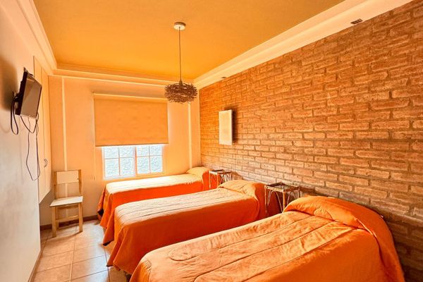 Habitación Triple (3 Individuales)