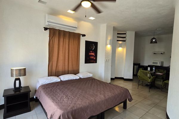 Villa con Balcón Superior