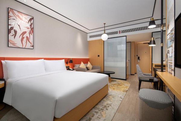 Habitación Deluxe con cama extragrande y sofá cama